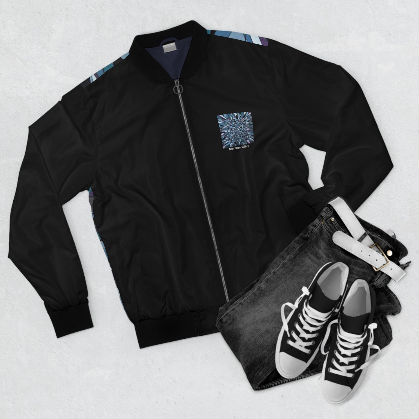 Black Bomber Jacket — a geometric artwork in blues and black emblaze the back of this classic bomber jacket