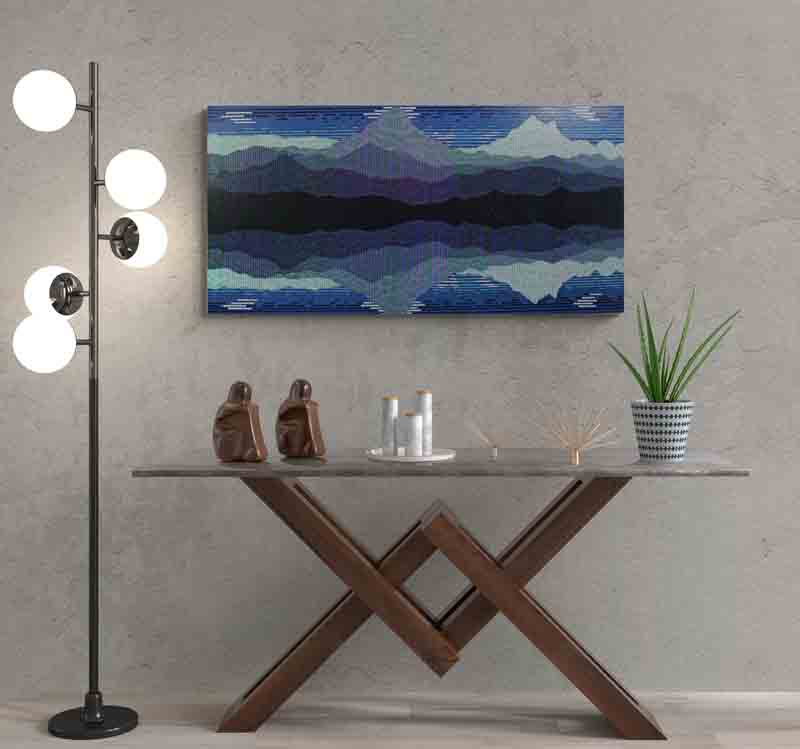 REFLECT is an abstract landscape of reflected mountains created using a pointillist style.