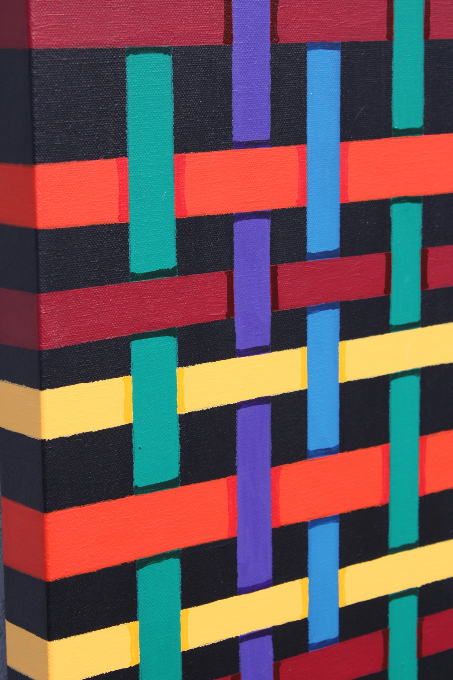 RIBBON ribbons of colour weave across the canvas like a magnified cloth.