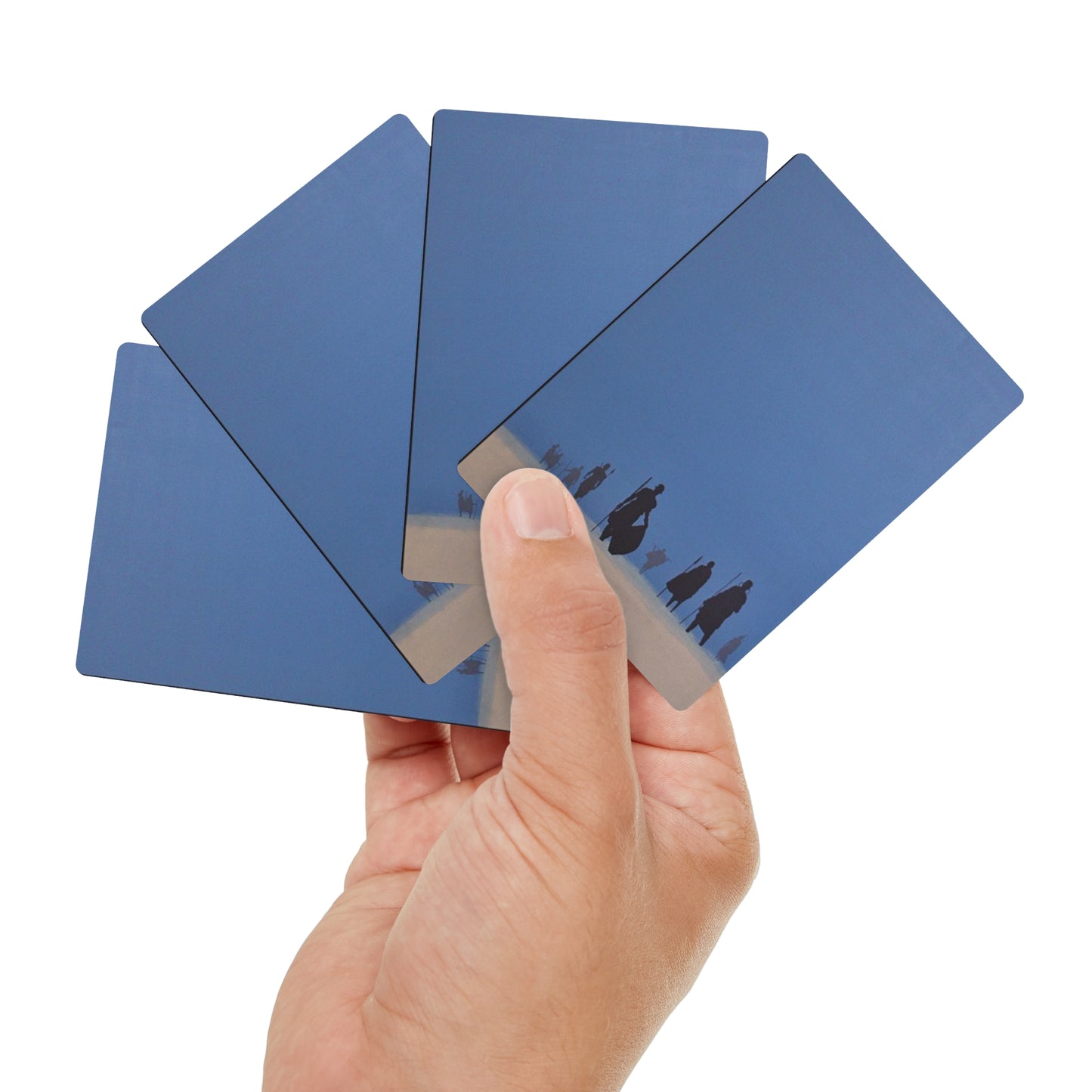 THE WARRIORS — African warriors silhouetted in a hot summer desert form the bases of these artwork playing cards.