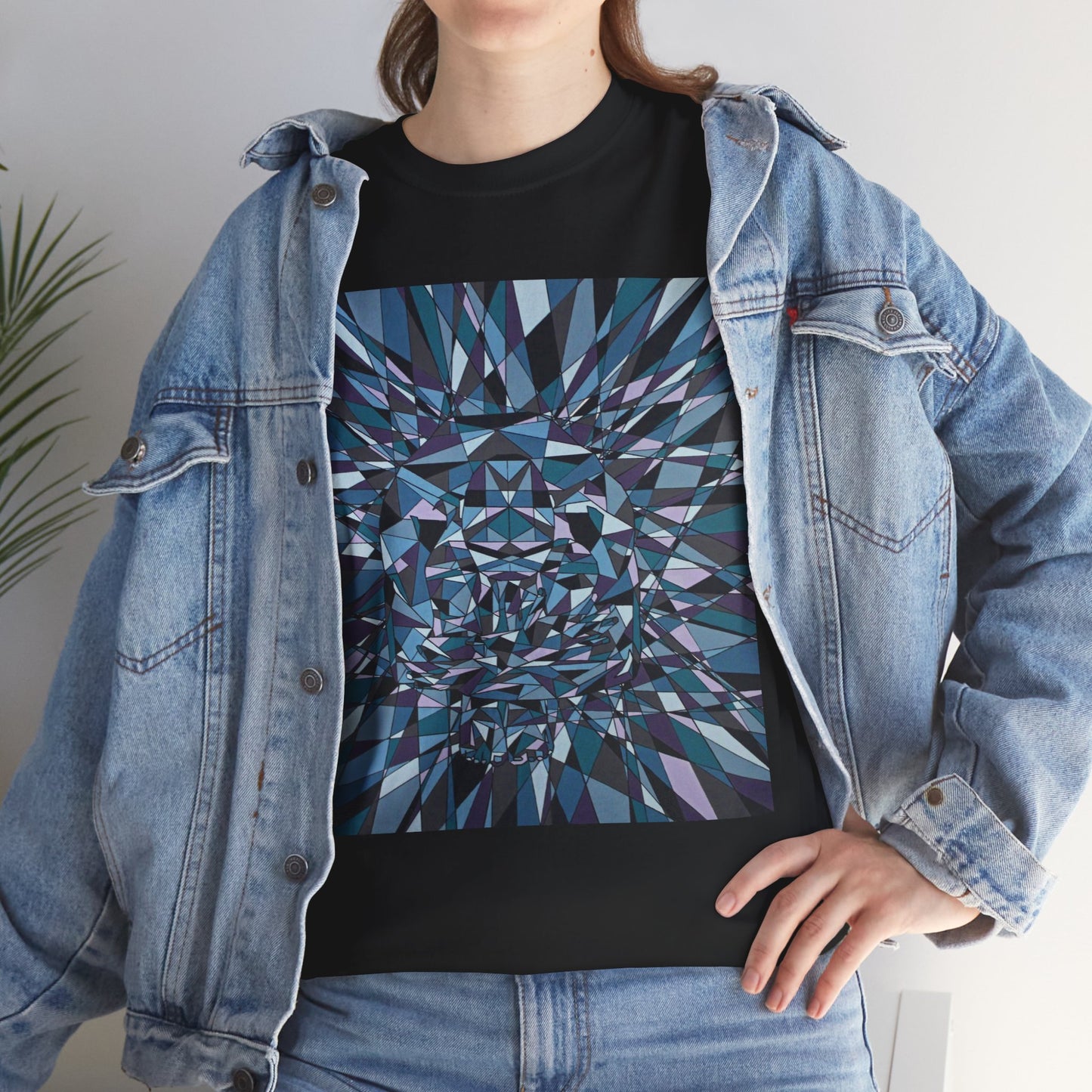 ISOLATION a bold sharp geometric image concealing a crouching figure in its heart making a bold image on this artful T-shirt.