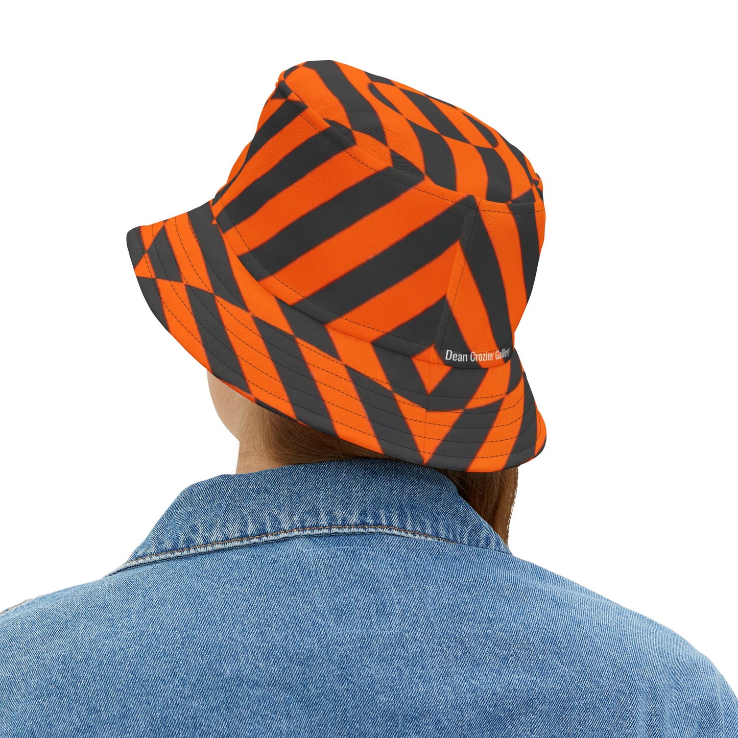 OPTICS 1 Bucket Hat — a bold Geometric design of orange and blue stripes. Streetwear by artist Dean Crozier