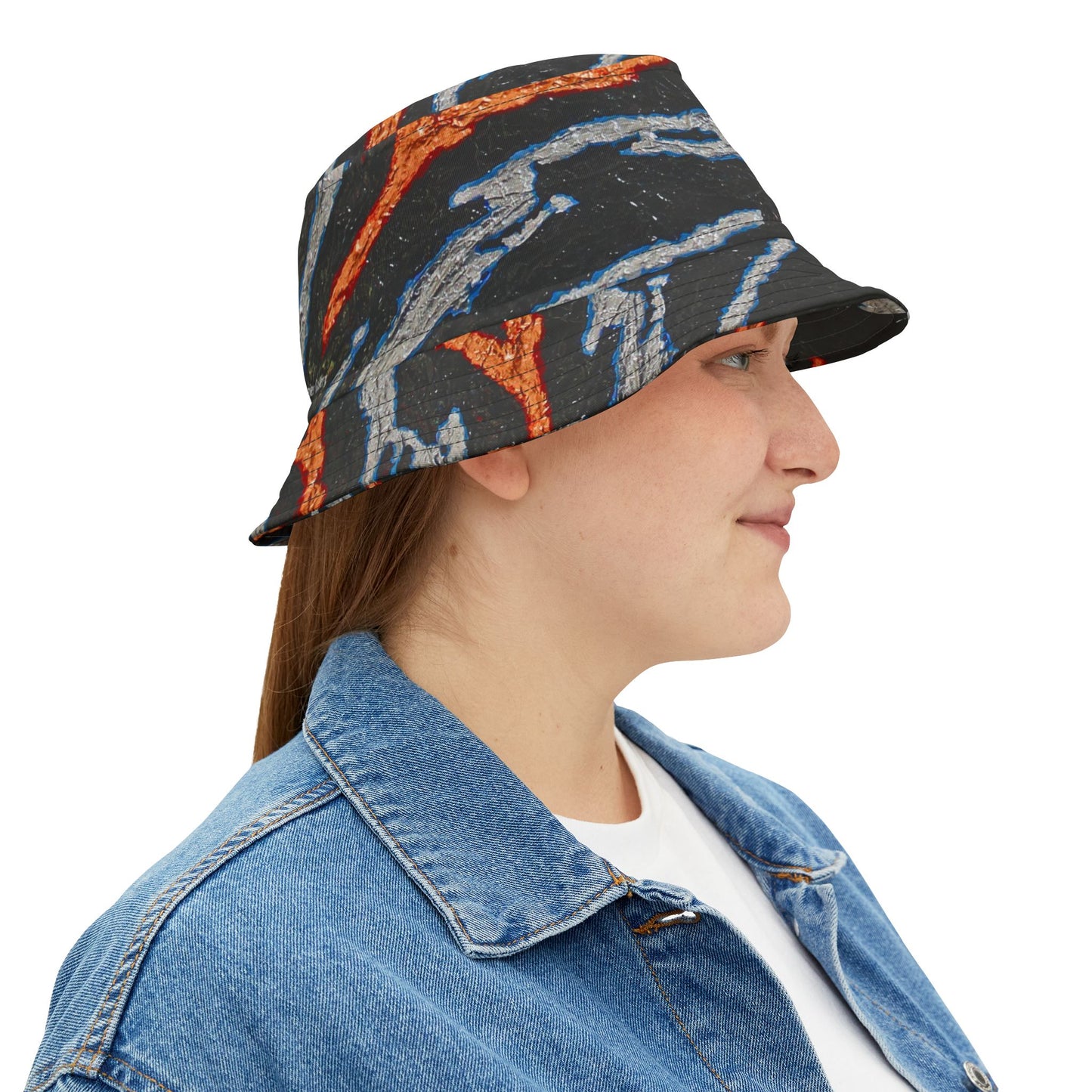 Bucket Hat metallic slashes — a bold design with slashes of gold and silver on a bed of black. Strong streetwear for a bold outfit