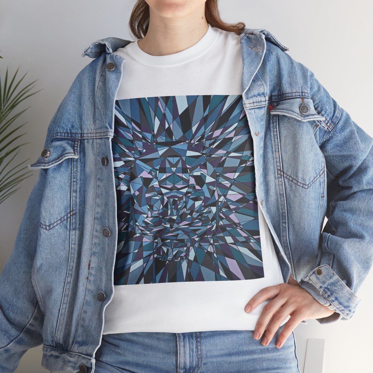 ISOLATION a bold sharp geometric image concealing a crouching figure in its heart making a bold image on this artful T-shirt.