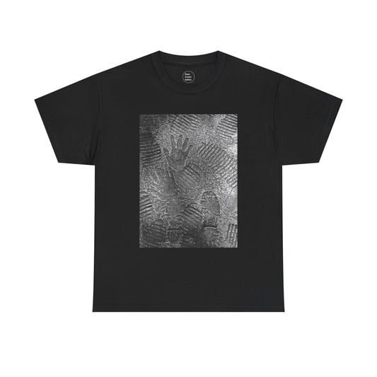 FOOTPATH is a photograph of footprints and hands placed into a wet cement footpath. creating a moment of modern life on this art T-shirt.