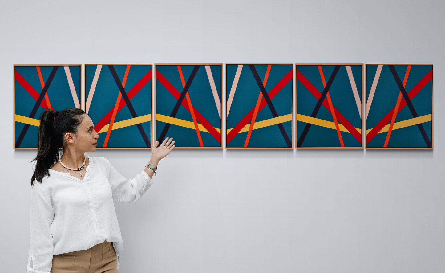 TEAL Bold geometric abstraction by Australian artist Dean Crozier. Six modular teal‑based canvases with intersecting colour bands create a dynamic, reconfigurable artwork suited to both expansive walls and compact spaces.